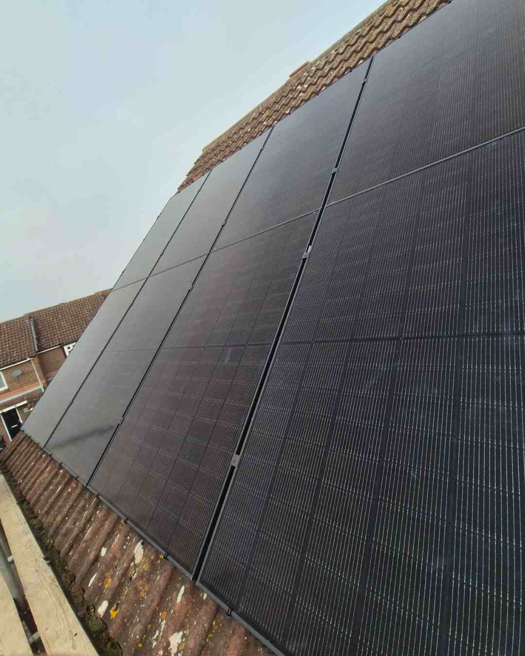 Close-up of a finished all-black solar array.